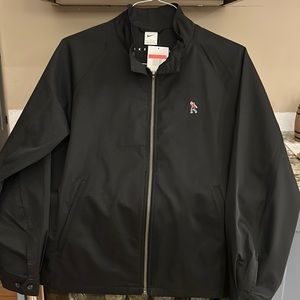 Men’s black Nike Golf rain jacket